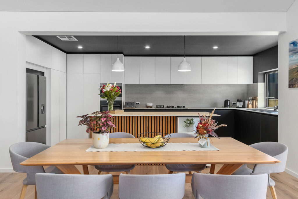 Unique black and white kitchen in sustainable home designed by an architect in Perth.